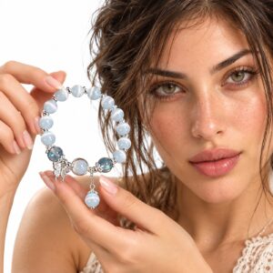 Natural blue Cat’s Eye butterfly bracelet with silver-tone charms and dangling bead detail