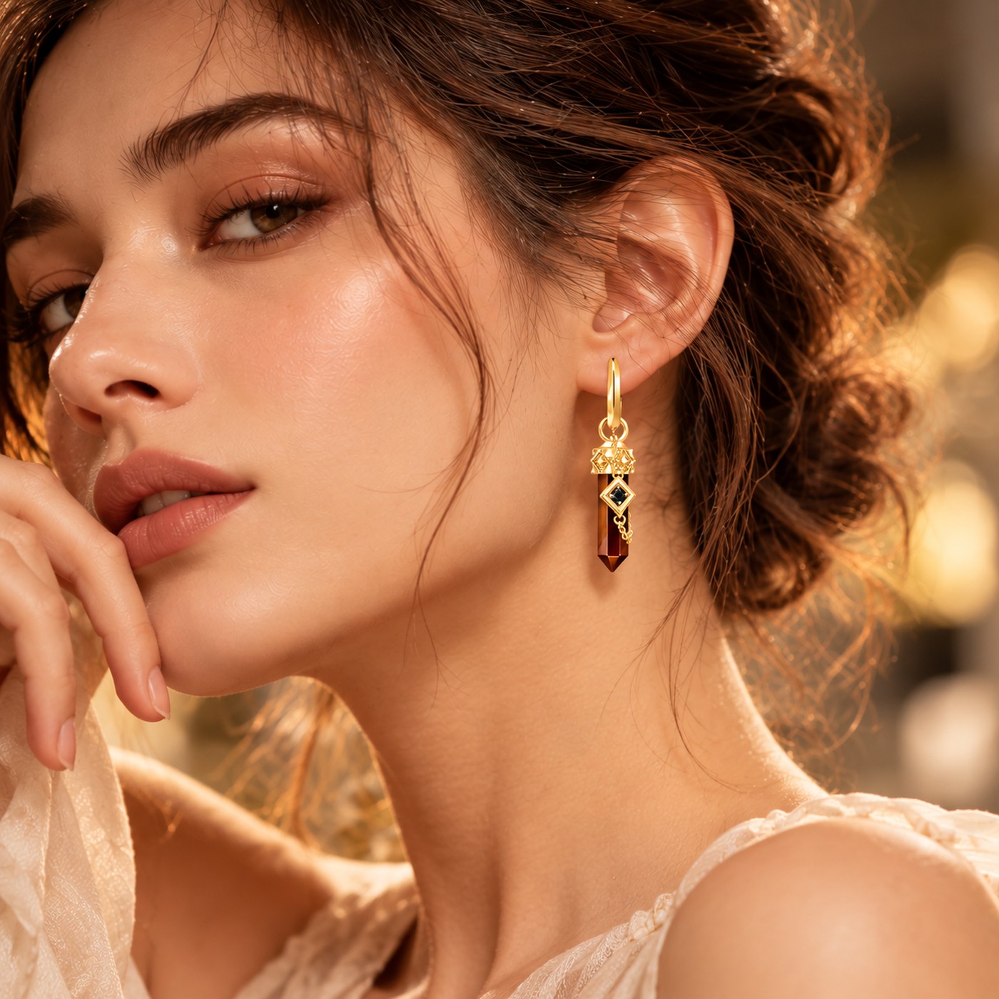 Thaddaeus geometric gold-tone drop earrings with faceted brown stone pendants and chain details