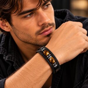 Men's multi-strand black braided leather bracelet featuring polished Tiger's Eye stones and a black magnetic clasp on a white background